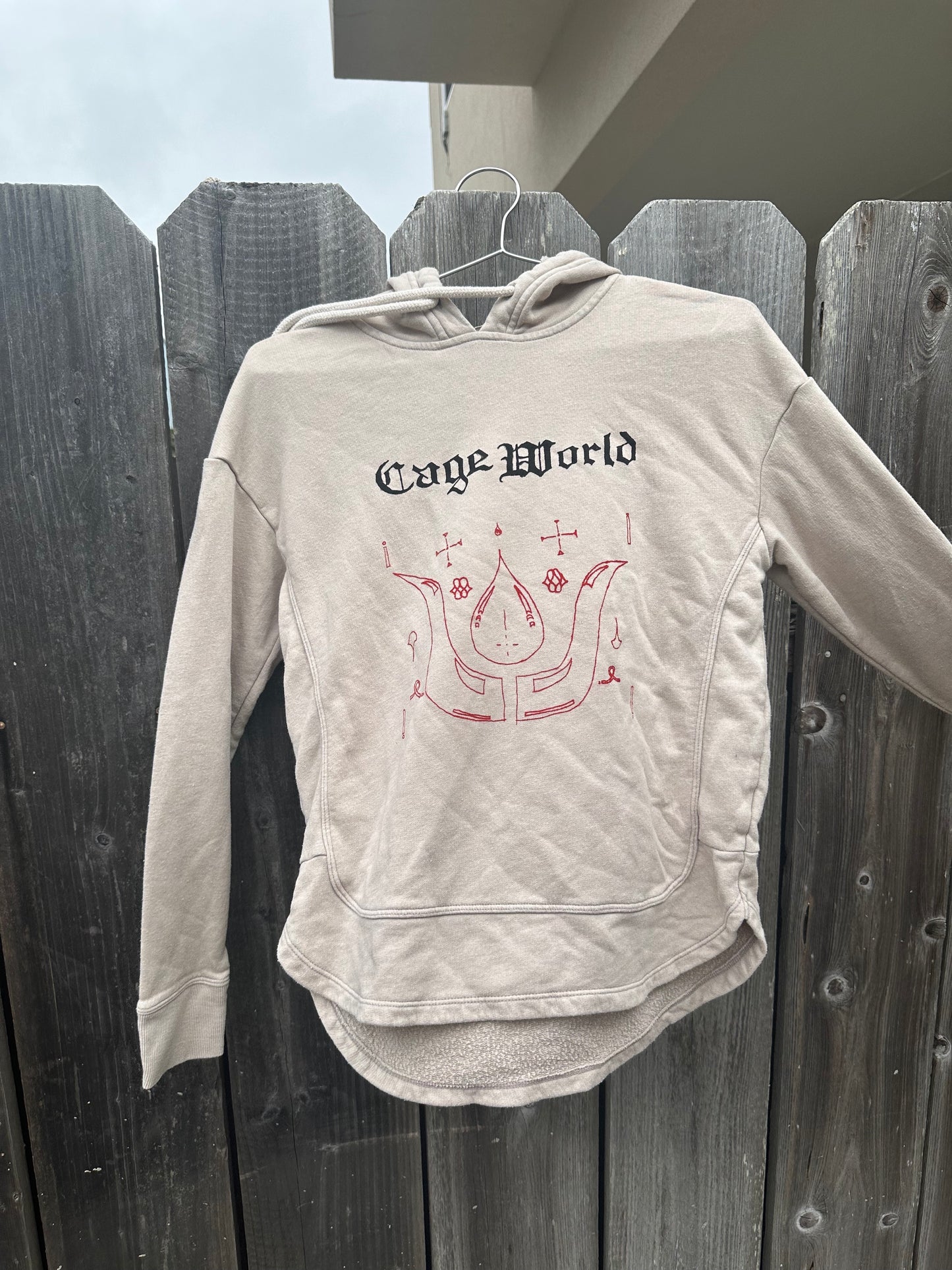 cage world weird hoodie
