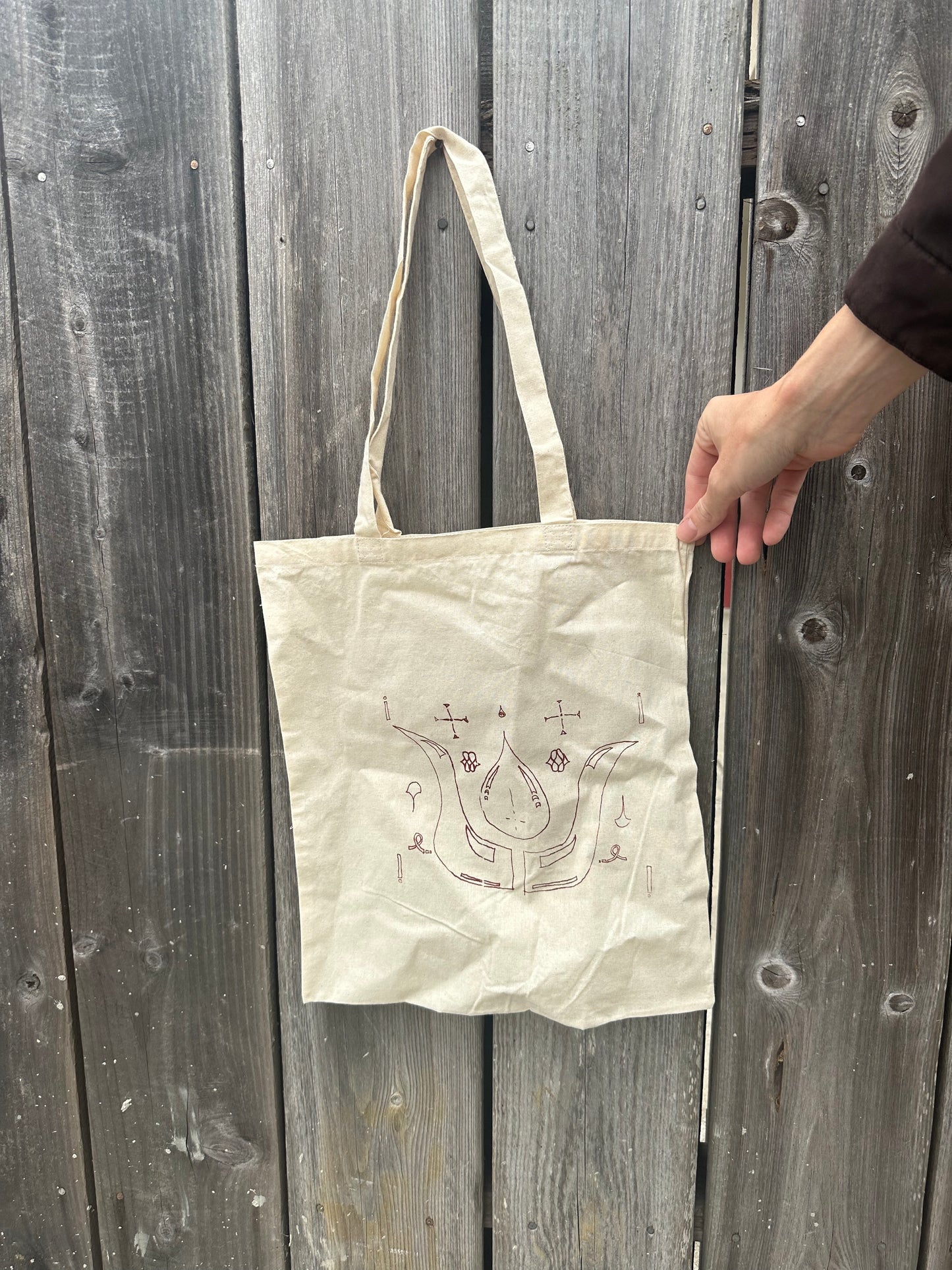 cage world tote bag