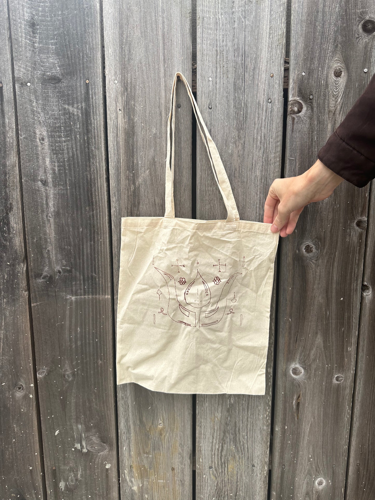 cage world-less tote bag